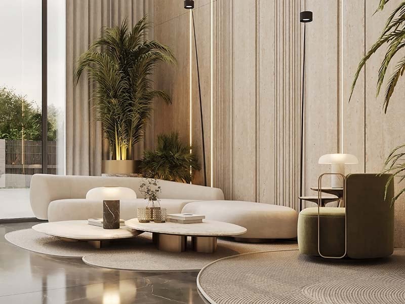 Cove by Imtiaz emerges in Dubailand as a vertical sanctuary. Its pearl white façade echoes the desert's timeless palette while its interiors redefine urban living. Within this tower, homes range from studios to two-bedroom retreats. Each space tells a story of thoughtful design. Kitchens become culinary stages with clean lines and intuitive layouts. Bathrooms transform into personal spas, marrying form and function. Bedrooms offer respite with views that frame Dubai's evolving skyline. Cove's true character unfolds in its shared spaces. An infinity pool seemingly merges with the horizon. For the active, a padel court awaits. A running track winds through the property, offering a path for morning jogs or evening strolls. Quieter moments find their place too. Serene cabanas offer pockets of tranquility. A yoga deck and a fully equipped gym, with its array of equipment, stand ready for those seeking a moment of calm or physical challenge. As day turns to evening, the open-air cinema flickers to life. Nearby, BBQ areas invite culinary experiments and social gatherings. Throughout Cove, green spaces create breathing room. These pockets of nature soften the urban edge, providing impromptu meeting spots or solitary retreats.