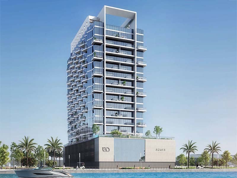 Azura Residences at Dubai Islands stands as a testament to coastal living. The towers rise from the shore, their clean lines and glass surfaces catching the light of sea and sky. Inside, homes range from one to three bedrooms. Each space is thoughtfully designed, with open layouts that make the most of natural light and views. Kitchens flow into living areas, creating spaces for both daily life and entertaining. Bedrooms offer a calm retreat, while bathrooms blend style with function. Life at Azura extends beyond private spaces. A pool invites residents to cool off and unwind. The fitness center caters to those who want to stay active. Children have their own area to play and explore. For social gatherings, a barbecue area sets the stage for shared meals and conversations. Step outside, and Dubai Islands unfolds. Beaches stretch along the coast, perfect for morning walks or evening strolls. Parks dot the landscape, offering green spaces for relaxation. Waterways weave through the islands, creating a unique blend of land and sea. The city's energy remains close, yet the immediate surroundings offer a sense of escape. Starting at AED 1.5M, Azura Residences at Dubai Islands offers 1 to 3-bedroom apartments. The handover is expected in Q2 2026 with a 60/40 payment plan.
