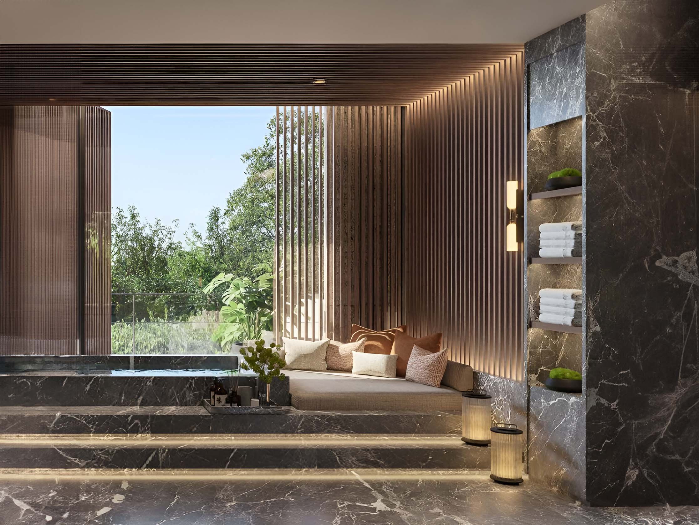 Serenity Mansions by Majid Al Futtaim rises in Tilal Al Ghaf, showcasing a series of 6-7 bedroom villas meticulously crafted to harmonize with their natural surroundings. Each villa features large glass facades and modern lines, allowing natural light to fill the interiors and connect the living spaces to the outdoors. The exterior design includes expansive terraces and private gardens, enhancing the outdoor living experience. Roof terraces provide panoramic views of the landscape, adding a serene space to relax. Facades combine natural materials with contemporary finishes for a striking yet understated look. Inside, Serenity Mansions emphasizes spaciousness and flexibility. Open-plan layouts create a free flow between rooms with high ceilings and large windows contributing to an airy atmosphere. Kitchens are equipped with modern appliances and ample storage while bathrooms offer a sanctuary-like retreat with elegant fixtures. Bedrooms, including master suites, provide privacy and comfort. The landscaping complements the villas with manicured gardens and private pools enhancing the outdoor spaces. Each villa's interior and exterior are designed to reflect a harmonious balance of modern living and natural beauty.