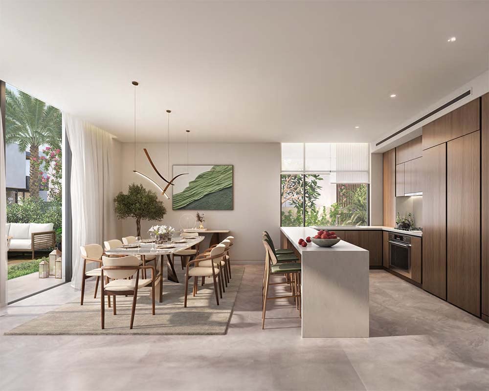 Dubai unveils a new orchestration of life: Athlon by Aldar. Nestled within Dubailand, this master-planned community caters to those who move with purpose. Architecturally designed townhouses and villas offer a range of configurations, from three and four-bedroom townhouses to expansive three to six-bedroom villas.  Stepping outside unveils Athlon by Aldar's vibrant core. A network of meticulously designed trails – a 4.6-kilometer running track, a family-friendly 2.2-kilometer path and a 3.7-kilometer cycling loop – weave through the community, inviting residents to connect with nature. Seven distinctive clubhouses punctuate the landscape, offering social spaces and havens for leisure.  Open-air cinemas, state-of-the-art workout zones, multiple sports and lap and family pools complete the picture of an active lifestyle. Lush greenery and dedicated parks with play areas provide a sanctuary for children and a tranquil escape for adults. This pioneering community is designed to achieve Fitwel and LEED Platinum certifications. Smart systems for air quality, irrigation, waste management, noise monitoring, and efficient water and HVAC control create a community that fosters harmony with the environment. Strategically positioned along Sheikh Zayed Bin Hamdan Al Nahyan Street, Athlon by Aldar enjoys excellent connectivity. Minutes away from schools, malls, and attractions, it offers a family-friendly address. Starting at AED 2.8 million, Athlon by Aldar offers three to six-bedroom townhouses and villas with a 70/30 payment plan. Handover is expected in Q2 2028.
