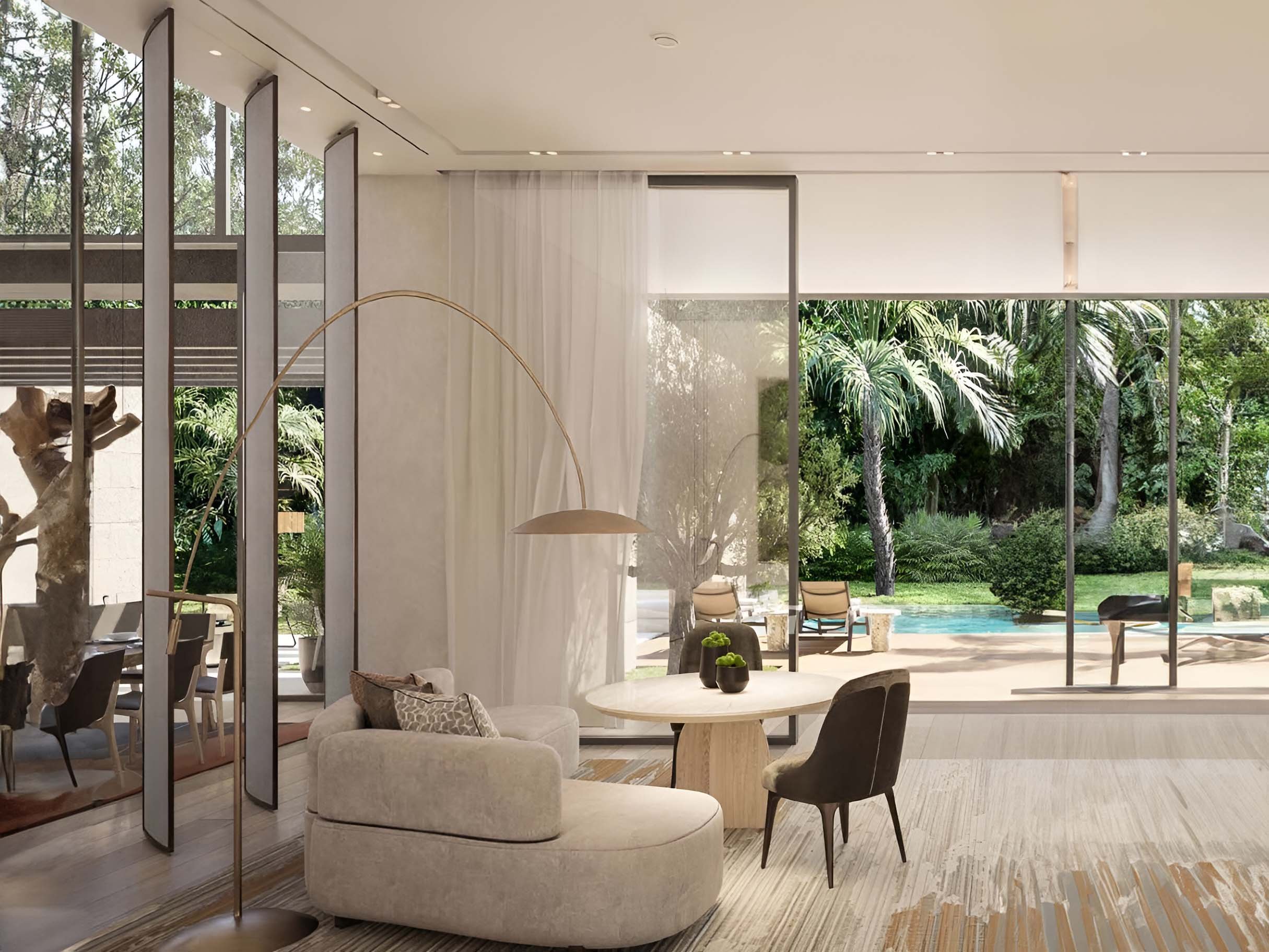 Serenity Mansions by Majid Al Futtaim rises in Tilal Al Ghaf, showcasing a series of 6-7 bedroom villas meticulously crafted to harmonize with their natural surroundings. Each villa features large glass facades and modern lines, allowing natural light to fill the interiors and connect the living spaces to the outdoors. The exterior design includes expansive terraces and private gardens, enhancing the outdoor living experience. Roof terraces provide panoramic views of the landscape, adding a serene space to relax. Facades combine natural materials with contemporary finishes for a striking yet understated look. Inside, Serenity Mansions emphasizes spaciousness and flexibility. Open-plan layouts create a free flow between rooms with high ceilings and large windows contributing to an airy atmosphere. Kitchens are equipped with modern appliances and ample storage while bathrooms offer a sanctuary-like retreat with elegant fixtures. Bedrooms, including master suites, provide privacy and comfort. The landscaping complements the villas with manicured gardens and private pools enhancing the outdoor spaces. Each villa's interior and exterior are designed to reflect a harmonious balance of modern living and natural beauty.