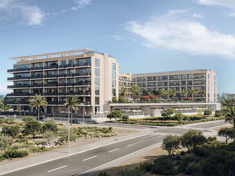 Aurora by Binghatti at Jumeirah Village Circle unfolds a new chapter in urban living. This project introduces a blend of simplicity and precision, seamlessly integrating with its surroundings. The design resonates with the rhythm of city life while creating a tranquil space for its residents. Aurora brings together form and function. The clean lines of its architecture are a testament to thoughtful design, aiming for a seamless blend with the cityscape. The facade engages with the skyline while providing a calm backdrop for residents. Inside, Aurora offers a range of living spaces from studios to 1-2 bedroom apartments. Each unit is crafted to enhance everyday life, maximizing natural light and providing a sense of openness. The interiors are designed with practicality in mind, balancing comfort with simplicity. The amenities at Aurora are tailored to support a balanced lifestyle. From the pools for all ages to the yoga area and fitness facilities, each element is positioned to foster well-being. Green spaces and relaxation areas invite residents to enjoy moments of peace amidst the city's rhythm.