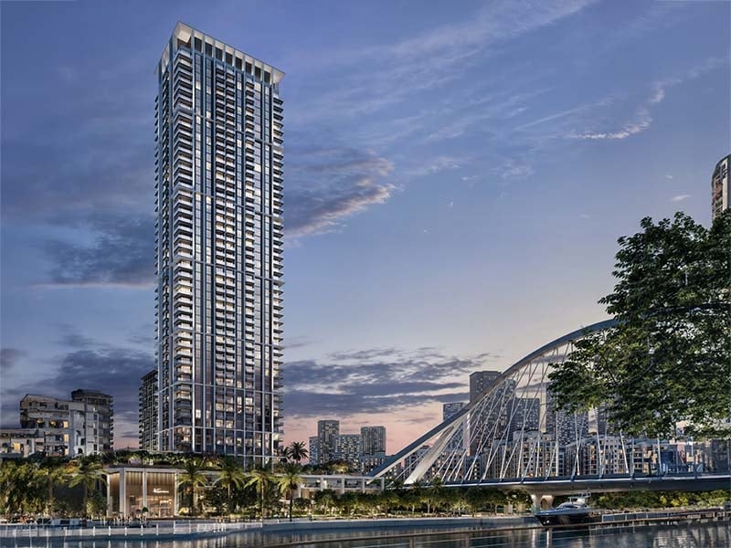 Arlo by Emaar sits in Dubai Creek Harbour, where modern design meets the gentle flow of the creek. This project offers a range of 1 to 3-bedroom apartments and 3-bedroom townhouses. Each home features open spaces and large windows that draw in natural light. Balconies extend the living area, inviting the outdoors in. In Arlo at Dubai Creek Harbour, daily life blends with the quiet charm of the water's edge. Paths wind through green spaces, perfect for leisurely strolls or morning runs. The nearby creek promenade offers spots for dining and shopping, creating a lively yet serene environment. Interiors at Arlo reflect thoughtful design. The blend of sleek lines and natural materials gives each space a calm, balanced feel. Kitchens, bedrooms and bathrooms are fitted with quality fixtures, ensuring comfort and style. Residents enjoy a range of amenities. The fitness center and pool provide spaces to relax and stay active while the yoga room and meditation areas offer a retreat for the mind. Children have dedicated play areas, both indoors and outdoors.