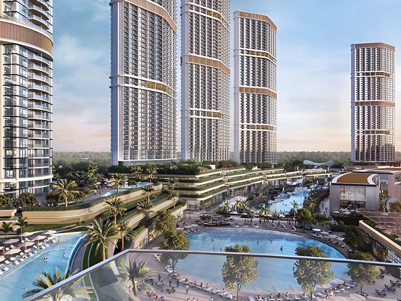 Skyscape Altius by Sobha Realty rises in Sobha Hartland II. It offers a blend of modern design and urban charm. The tower stands tall with 85 stories, each crafted to provide a sense of space and light. Here, every home opens to views of clear waters and the vibrant cityscape. The balance between natural beauty and urban life is seamless. Inside, you will find spaces designed for comfort and elegance. The layout of each apartment reflects a thoughtful approach to living. From one-bedroom to three-bedroom options, each home caters to different needs and preferences. The interiors showcase a blend of form and function, creating spaces that are both stylish and practical. Skyscape Altius at Sobha Hartland II offers more than just a place to live. It provides a lifestyle where the details matter. The open spaces and high ceilings add to the feeling of freedom and light. The views from the windows are more than just a sight; they are part of the living experience. This project is designed for those who seek both tranquility and connection to the city's pulse.