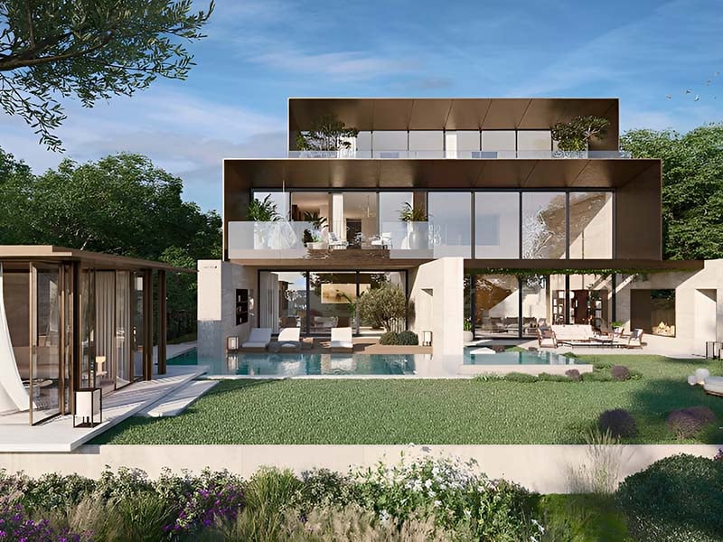 Serenity Mansions by Majid Al Futtaim rises in Tilal Al Ghaf, showcasing a series of 6-7 bedroom villas meticulously crafted to harmonize with their natural surroundings. Each villa features large glass facades and modern lines, allowing natural light to fill the interiors and connect the living spaces to the outdoors. The exterior design includes expansive terraces and private gardens, enhancing the outdoor living experience. Roof terraces provide panoramic views of the landscape, adding a serene space to relax. Facades combine natural materials with contemporary finishes for a striking yet understated look. Inside, Serenity Mansions emphasizes spaciousness and flexibility. Open-plan layouts create a free flow between rooms with high ceilings and large windows contributing to an airy atmosphere. Kitchens are equipped with modern appliances and ample storage while bathrooms offer a sanctuary-like retreat with elegant fixtures. Bedrooms, including master suites, provide privacy and comfort. The landscaping complements the villas with manicured gardens and private pools enhancing the outdoor spaces. Each villa's interior and exterior are designed to reflect a harmonious balance of modern living and natural beauty.