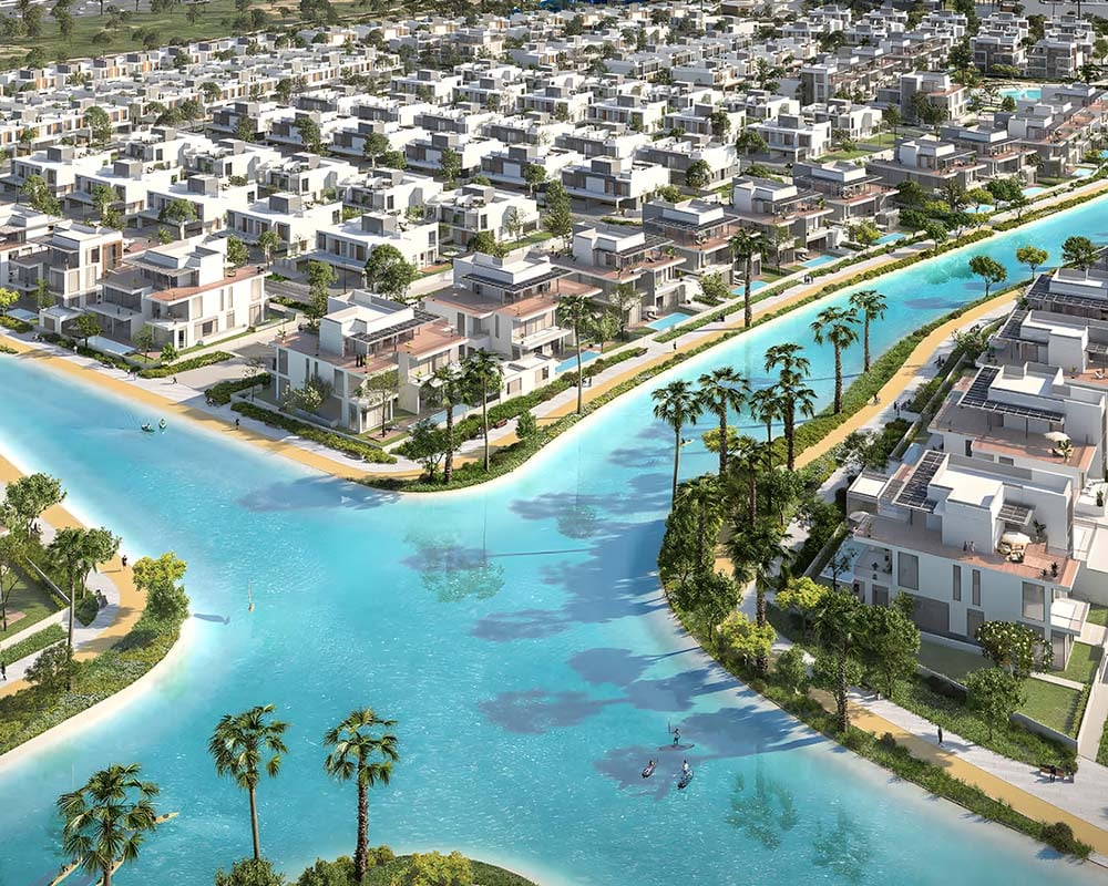 A new vision of modern living unfolds in Dubai South. Residences at South Bay range from expansive 3-bedroom townhouses to palatial 7-bedroom mansions, each a haven crafted for comfort and grand living. Open floor plans bathe interiors in natural light, while sprawling private gardens extend living areas outdoors. Townhouses boast rooftop terraces, perfect for starlit gatherings.  For those seeking the ultimate indulgence, a limited collection of waterfront villas and expansive mansions offer a private sanctuary beside a 3-kilometer crystal lagoon. Residents unwind amidst a wealth of amenities. A fully equipped gym caters to fitness enthusiasts, while a beach clubhouse beckons with lazy afternoons. Lush parks and meditation gardens provide tranquil escapes, while children find joy in dedicated playgrounds. Jogging tracks weave through the development and pedestrian-friendly spaces encourage exploration. A nearby shopping mall offers convenient retail therapy. Perfectly positioned, South Bay boasts direct access to EXPO Road and a five-minute drive to Dubai World Central Airport and EXPO 2020. The development enjoys excellent connectivity to Al Khail and Umm Sequim with planned metro and Etihad Rail connections further enhancing accessibility. Starting at 3.3 million AED, South Bay offers a collection of townhouses, villas and mansions. Homes are scheduled for handover in Q3 2026 with a flexible 60/40 payment plan available.