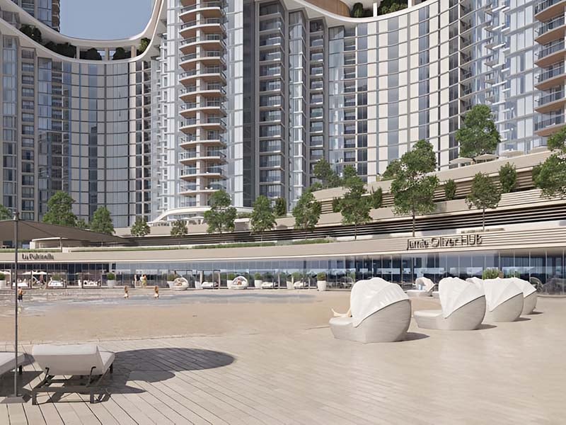 Skyscape Altius by Sobha Realty rises in Sobha Hartland II. It offers a blend of modern design and urban charm. The tower stands tall with 85 stories, each crafted to provide a sense of space and light. Here, every home opens to views of clear waters and the vibrant cityscape. The balance between natural beauty and urban life is seamless. Inside, you will find spaces designed for comfort and elegance. The layout of each apartment reflects a thoughtful approach to living. From one-bedroom to three-bedroom options, each home caters to different needs and preferences. The interiors showcase a blend of form and function, creating spaces that are both stylish and practical. Skyscape Altius at Sobha Hartland II offers more than just a place to live. It provides a lifestyle where the details matter. The open spaces and high ceilings add to the feeling of freedom and light. The views from the windows are more than just a sight; they are part of the living experience. This project is designed for those who seek both tranquility and connection to the city's pulse.