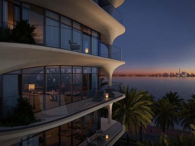 At the heart of Ocean House by Ellington Properties lies a commitment to exquisite oceanside living. Within this haven, a diverse range of 2 to 6-bedroom apartments, duplexes and penthouses awaits. As you step into the lobby, you'll be greeted by a minimalist hotel-like ambiance, defined by a double-height ceiling and elegant neutral decor. Lush greenery enhances the welcoming atmosphere, creating a serene sanctuary for residents and guests alike. Inside, these thoughtfully crafted abodes open to a world of contemporary elegance. With spacious designs and sophisticated neutral palettes, the interiors of Ocean House exude tranquility and sophistication. Floor-to-ceiling windows flood the space with natural light, offering residents breathtaking views of the surroundings. As you explore further, you'll find yourself drawn to the lush private pools and gardens, offering a tranquil retreat amidst the bustling city. Designed with utmost privacy and serenity in mind, these outdoor spaces provide residents with a sanctuary to relax and unwind. Venturing beyond the confines of your home, you'll encounter a wealth of private club-inspired amenities, including a 50-meter Olympic swimming pool, a wellness studio, clubhouse and cinema room.  Starting at AED 9.5M, Ocean House by Ellington Properties offers 2 to 6-bedroom apartments, duplexes and penthouses. The handover is expected in Q2 2026 with a 70/30 payment plan.