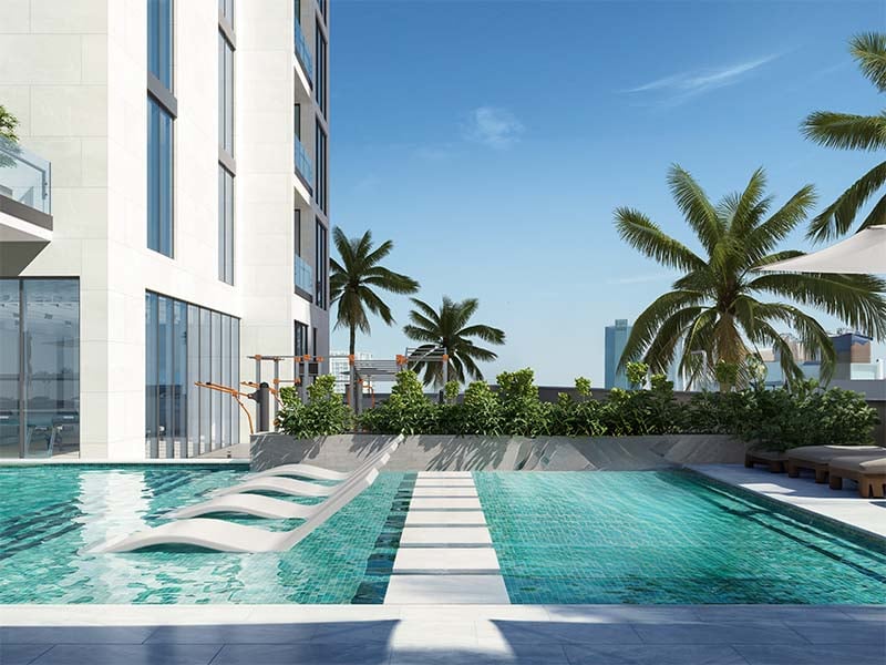 RA1N Residence by Object 1 rises 25 stories in Jumeirah Village Circle. This development offers one and two-bedroom apartments designed with a focus on modern living. The building’s facade features crisp lines and glass, creating a sleek and contemporary look. Natural hues inside add warmth and calm. The layout of each apartment at RA1N Residence ensures open, airy spaces. Large windows bring in light and offer views, connecting residents with the outside world. The interiors focus on both form and function, making everyday life smooth and pleasant. Wood accents and simple finishes enhance the sense of a serene retreat. Amenities at RA1N Residence enhance daily life. Residents can enjoy social spaces, fitness areas and a pool. These shared spaces are designed to foster a sense of community and provide spots for relaxation and activity. The building's design supports both privacy and interaction, balancing the needs of modern urban living. Each apartment at RA1N Residence offers a blend of style and comfort. Thoughtful design choices create inviting spaces. These homes provide a peaceful escape from the city's hustle, with a focus on simplicity and ease. Starting at AED 930K, RA1N Residence by Object 1 offers one and two-bedroom apartments. The handover is expected in Q4 2024 with a 60/40 payment plan.