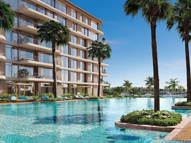 Bay Grove Residences by Nakheel offers a luxurious waterfront lifestyle in the heart of Dubai Islands. This stunning development features premium 1, 2 and 3-bedroom apartments, as well as exquisite 4-bedroom penthouses. Each residence is thoughtfully designed with spacious layouts, incorporating natural light and elegant finishes, creating a serene atmosphere. The interiors boast soft tones, warm wood accents and high-quality materials, ensuring a perfect blend of comfort and sophistication. Residents at Bay Grove Residences can indulge in a wide array of world-class amenities. The property includes an impressive infinity pool overlooking the ocean, beautifully landscaped podium gardens, a state-of-the-art fitness center and a dedicated kids’ play area. Additionally, the exclusive clubhouse and residents' lounge provide an elegant space for social gatherings and events, fostering a sense of community among residents. Located on Dubai Islands, Bay Grove Residences offers easy access to 20 kilometers of pristine beaches and a vibrant lifestyle surrounded by nature. The new Infinity Bridge connects these islands to the city, enhancing accessibility and convenience. Residents will appreciate the balance between urban living and tranquil coastal charm. Starting at AED 1.85M, Bay Grove Residences at Dubai Islands offers 1 to 3-bedroom apartments with handover expected in Q3 2028 and a 80/20 payment plan.