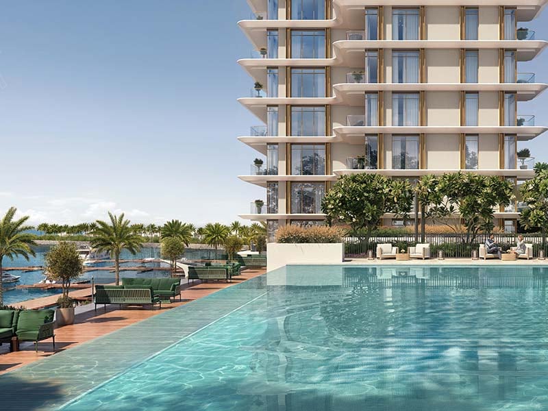Marina Views unfolds at the heart of Rashid Yachts & Marina, a captivating hub where the vibrant energy of Dubai meets the tranquility of waterfront living. Here, expansive windows within each residence frame breathtaking panoramas of the marina, creating a seamless connection to the surrounding beauty. Open floor plans bathed in natural light set the stage for a modern lifestyle. Sleek kitchens, featuring premium appliances and ample counter space, invite culinary exploration. Masterfully crafted bathrooms offer a haven for relaxation, boasting high-quality fixtures and elegant finishes. Each residence features generous closet space, ensuring a clutter-free environment. Step onto your private balcony and witness the captivating sunrise paint the marina with vibrant hues. Gaze upon the city's dazzling lights come nightfall or simply bask in the endless panorama that unfolds before you. Beyond your private sanctuary, Marina Views boasts a curated selection of amenities designed to enhance well-being. State-of-the-art fitness facilities cater to various exercise preferences, offering the perfect space to maintain an active lifestyle. Infinity pools with breathtaking views create an idyllic spot for relaxation while dedicated children's play areas offer a haven for young residents.