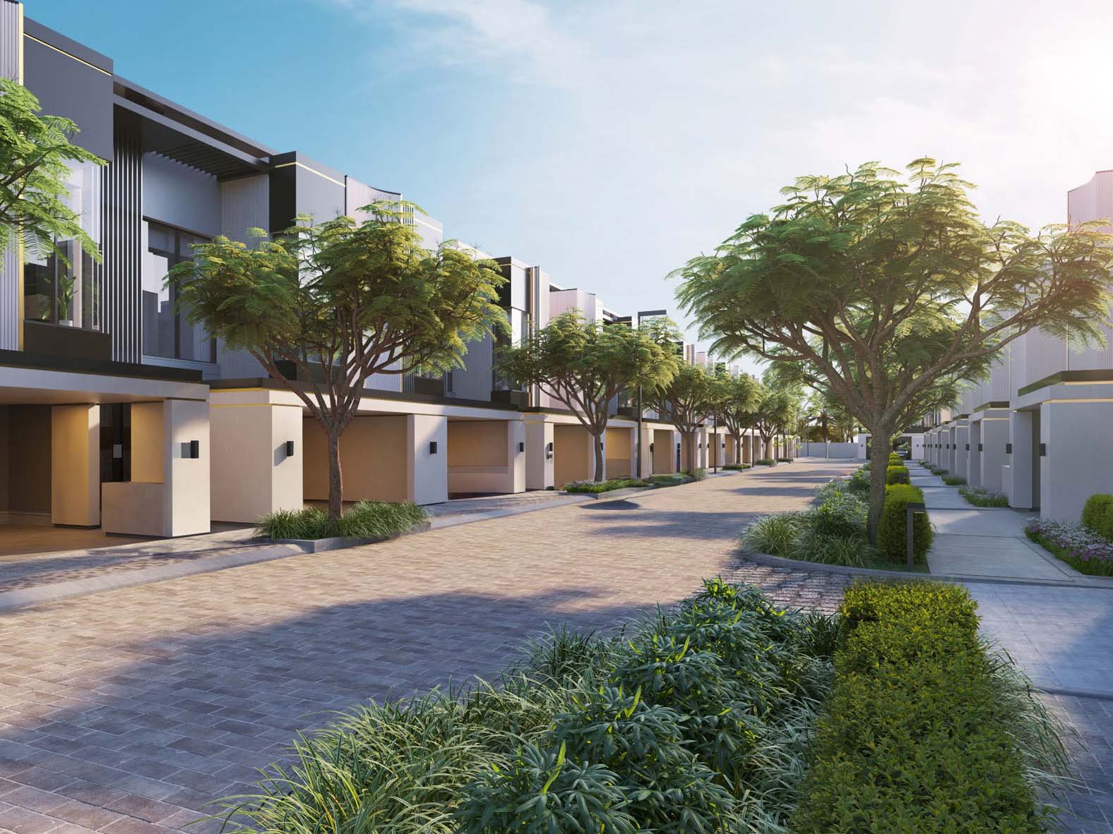 Ellington Properties unveils The Watercrest, a new addition to Mohammed Bin Rashid City. The community is defined by its flowing water features which elegantly merge with beautifully landscaped green spaces and gracefully curved pathways. Three distinct neighborhoods form The Watercrest. The Riverine offers 31 homes, each embracing the water's edge. The Alcove, with 25 units, provides intimate spaces for those who value privacy. The Arcadia rounds out the community with 28 residences, balancing openness and seclusion. Townhouses and villas stand in harmony with their surroundings. Three-bedroom townhouses flow from room to room while four-bedroom villas expand possibilities for family life. Large windows frame ever-changing views of gardens and water features. Inside, materials engage the senses. Wood warms underfoot, stone cools to the touch. Light plays across surfaces, shifting moods from dawn to dusk. Outdoor spaces become natural extensions of home from cozy balconies to spacious gardens. A river club anchors community life, its plunge pool a gathering point on warm days. Fitness and yoga studios promote well-being while an outdoor cinema brings neighbors together under the stars. Children find their own spaces in play areas and a dedicated kids' club.