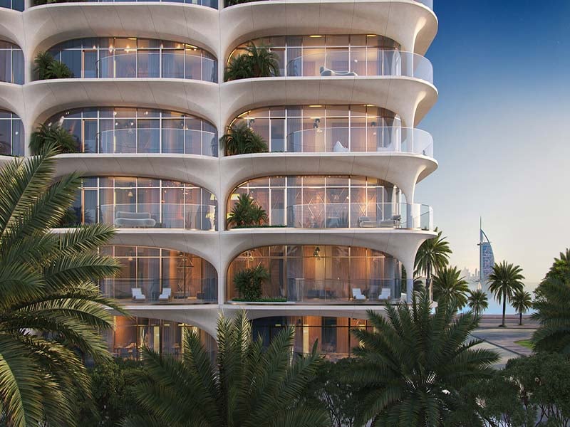 At the heart of Ocean House by Ellington Properties lies a commitment to exquisite oceanside living. Within this haven, a diverse range of 2 to 6-bedroom apartments, duplexes and penthouses awaits. As you step into the lobby, you'll be greeted by a minimalist hotel-like ambiance, defined by a double-height ceiling and elegant neutral decor. Lush greenery enhances the welcoming atmosphere, creating a serene sanctuary for residents and guests alike. Inside, these thoughtfully crafted abodes open to a world of contemporary elegance. With spacious designs and sophisticated neutral palettes, the interiors of Ocean House exude tranquility and sophistication. Floor-to-ceiling windows flood the space with natural light, offering residents breathtaking views of the surroundings. As you explore further, you'll find yourself drawn to the lush private pools and gardens, offering a tranquil retreat amidst the bustling city. Designed with utmost privacy and serenity in mind, these outdoor spaces provide residents with a sanctuary to relax and unwind. Venturing beyond the confines of your home, you'll encounter a wealth of private club-inspired amenities, including a 50-meter Olympic swimming pool, a wellness studio, clubhouse and cinema room.  Starting at AED 9.5M, Ocean House by Ellington Properties offers 2 to 6-bedroom apartments, duplexes and penthouses. The handover is expected in Q2 2026 with a 70/30 payment plan.