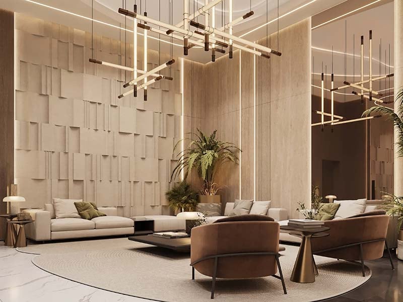 Cove by Imtiaz emerges in Dubailand as a vertical sanctuary. Its pearl white façade echoes the desert's timeless palette while its interiors redefine urban living. Within this tower, homes range from studios to two-bedroom retreats. Each space tells a story of thoughtful design. Kitchens become culinary stages with clean lines and intuitive layouts. Bathrooms transform into personal spas, marrying form and function. Bedrooms offer respite with views that frame Dubai's evolving skyline. Cove's true character unfolds in its shared spaces. An infinity pool seemingly merges with the horizon. For the active, a padel court awaits. A running track winds through the property, offering a path for morning jogs or evening strolls. Quieter moments find their place too. Serene cabanas offer pockets of tranquility. A yoga deck and a fully equipped gym, with its array of equipment, stand ready for those seeking a moment of calm or physical challenge. As day turns to evening, the open-air cinema flickers to life. Nearby, BBQ areas invite culinary experiments and social gatherings. Throughout Cove, green spaces create breathing room. These pockets of nature soften the urban edge, providing impromptu meeting spots or solitary retreats.