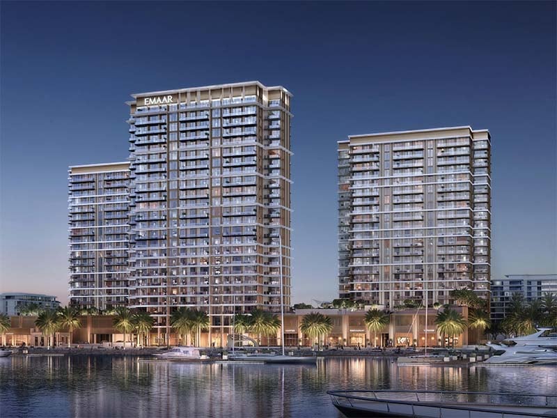 Marina Views unfolds at the heart of Rashid Yachts & Marina, a captivating hub where the vibrant energy of Dubai meets the tranquility of waterfront living. Here, expansive windows within each residence frame breathtaking panoramas of the marina, creating a seamless connection to the surrounding beauty. Open floor plans bathed in natural light set the stage for a modern lifestyle. Sleek kitchens, featuring premium appliances and ample counter space, invite culinary exploration. Masterfully crafted bathrooms offer a haven for relaxation, boasting high-quality fixtures and elegant finishes. Each residence features generous closet space, ensuring a clutter-free environment. Step onto your private balcony and witness the captivating sunrise paint the marina with vibrant hues. Gaze upon the city's dazzling lights come nightfall or simply bask in the endless panorama that unfolds before you. Beyond your private sanctuary, Marina Views boasts a curated selection of amenities designed to enhance well-being. State-of-the-art fitness facilities cater to various exercise preferences, offering the perfect space to maintain an active lifestyle. Infinity pools with breathtaking views create an idyllic spot for relaxation while dedicated children's play areas offer a haven for young residents.