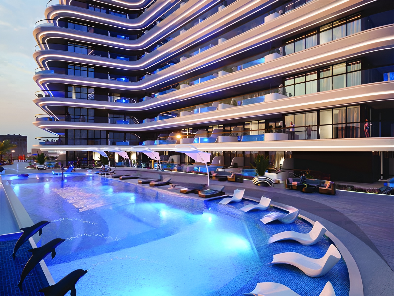 Samana Portofino unfolds in Dubai Production City, a haven where Italian Riviera charm meets urban sophistication. This residential gem crafts a narrative of elevated living through thoughtful design and attention to detail. Sleek lines and sun-drenched spaces define the architecture, drawing eyes upward and outward. Each home boasts a private pool, a liquid mirror reflecting Dubai's dynamic skyline. Studios and one to two-bedroom apartments offer versatile living options, each a canvas awaiting personal touches. Interiors breathe with natural light streaming through floor-to-ceiling windows. Balconies blur the line between indoors and out, expanding living spaces into the open air. Neutral palettes and premium finishes set the stage for individual expression. Kitchens hum with state-of-the-art appliances, inviting culinary creativity. A fitness center occupies space within the complex, outfitted with a range of equipment. Green spaces and walking paths wind through the property, adding natural elements to the urban setting. Dubai Production City thrums around Samana Portofino, a vibrant hub of activity and opportunity. Major arteries connect residents to the wider city while an array of dining, shopping and entertainment options lie within easy reach. Starting at AED 676K Samana Portofino by Samana offers studios and one to two-bedroom apartments. The handover is expected in Q1 2026 with a 50/50 payment plan.