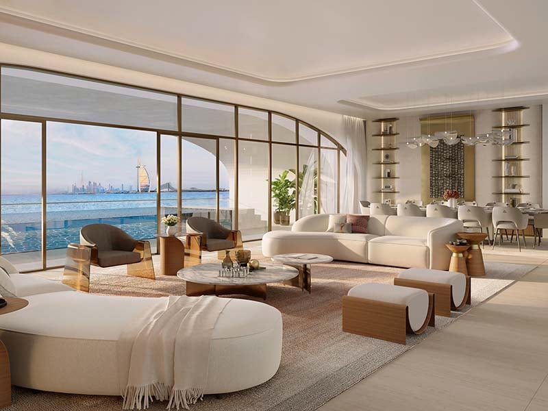 At the heart of Ocean House by Ellington Properties lies a commitment to exquisite oceanside living. Within this haven, a diverse range of 2 to 6-bedroom apartments, duplexes and penthouses awaits. As you step into the lobby, you'll be greeted by a minimalist hotel-like ambiance, defined by a double-height ceiling and elegant neutral decor. Lush greenery enhances the welcoming atmosphere, creating a serene sanctuary for residents and guests alike. Inside, these thoughtfully crafted abodes open to a world of contemporary elegance. With spacious designs and sophisticated neutral palettes, the interiors of Ocean House exude tranquility and sophistication. Floor-to-ceiling windows flood the space with natural light, offering residents breathtaking views of the surroundings. As you explore further, you'll find yourself drawn to the lush private pools and gardens, offering a tranquil retreat amidst the bustling city. Designed with utmost privacy and serenity in mind, these outdoor spaces provide residents with a sanctuary to relax and unwind. Venturing beyond the confines of your home, you'll encounter a wealth of private club-inspired amenities, including a 50-meter Olympic swimming pool, a wellness studio, clubhouse and cinema room.  Starting at AED 9.5M, Ocean House by Ellington Properties offers 2 to 6-bedroom apartments, duplexes and penthouses. The handover is expected in Q2 2026 with a 70/30 payment plan.