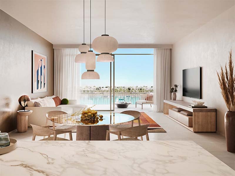 Bay Grove Residences by Nakheel offers a luxurious waterfront lifestyle in the heart of Dubai Islands. This stunning development features premium 1, 2 and 3-bedroom apartments, as well as exquisite 4-bedroom penthouses. Each residence is thoughtfully designed with spacious layouts, incorporating natural light and elegant finishes, creating a serene atmosphere. The interiors boast soft tones, warm wood accents and high-quality materials, ensuring a perfect blend of comfort and sophistication. Residents at Bay Grove Residences can indulge in a wide array of world-class amenities. The property includes an impressive infinity pool overlooking the ocean, beautifully landscaped podium gardens, a state-of-the-art fitness center and a dedicated kids’ play area. Additionally, the exclusive clubhouse and residents' lounge provide an elegant space for social gatherings and events, fostering a sense of community among residents. Located on Dubai Islands, Bay Grove Residences offers easy access to 20 kilometers of pristine beaches and a vibrant lifestyle surrounded by nature. The new Infinity Bridge connects these islands to the city, enhancing accessibility and convenience. Residents will appreciate the balance between urban living and tranquil coastal charm. Starting at AED 1.85M, Bay Grove Residences at Dubai Islands offers 1 to 3-bedroom apartments with handover expected in Q3 2028 and a 80/20 payment plan.