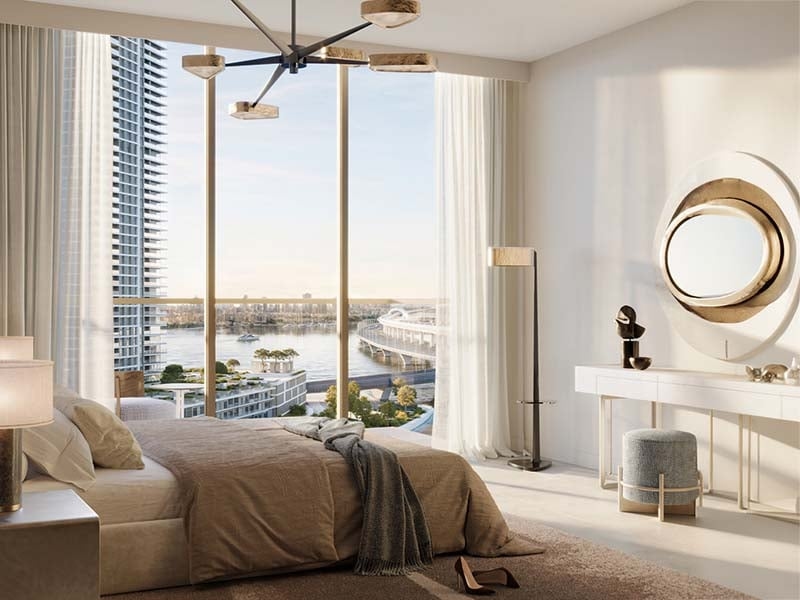 Arlo by Emaar sits in Dubai Creek Harbour, where modern design meets the gentle flow of the creek. This project offers a range of 1 to 3-bedroom apartments and 3-bedroom townhouses. Each home features open spaces and large windows that draw in natural light. Balconies extend the living area, inviting the outdoors in. In Arlo at Dubai Creek Harbour, daily life blends with the quiet charm of the water's edge. Paths wind through green spaces, perfect for leisurely strolls or morning runs. The nearby creek promenade offers spots for dining and shopping, creating a lively yet serene environment. Interiors at Arlo reflect thoughtful design. The blend of sleek lines and natural materials gives each space a calm, balanced feel. Kitchens, bedrooms and bathrooms are fitted with quality fixtures, ensuring comfort and style. Residents enjoy a range of amenities. The fitness center and pool provide spaces to relax and stay active while the yoga room and meditation areas offer a retreat for the mind. Children have dedicated play areas, both indoors and outdoors.