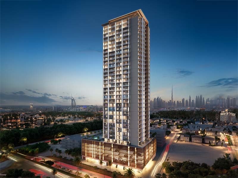 The Fifth Tower by Object 1 in Jumeirah Village Circle stands as a striking addition to Dubai's skyline. This 36-floor project offers studios and one to two-bedroom apartments designed with clean lines and modern elements. The Fifth Tower features spaces that flow with ease. Each unit offers a neutral palette and spacious layout, ensuring a calm and inviting atmosphere. Large windows draw in light and frame views of the city. Inside, wood accents and thoughtful finishes add warmth and a sense of home. Residents enter through a welcoming lobby lounge with seating and concierge services. Amenities cater to diverse needs. A pool and kid’s play area provide spaces for leisure, while a gym supports an active lifestyle. An indoor cinema adds a touch of entertainment. Each shared space enhances the living experience, fostering a sense of community. Living at The Fifth Tower at Jumeirah Village Circle means enjoying a blend of urban convenience and peaceful spaces. The thoughtful layout and design choices ensure each home is both functional and pleasing to the eye. It's a place where residents can relax, entertain and thrive. Starting at AED 554K, The Fifth Tower by Object 1 offers studios and one to two-bedroom apartments. The handover is expected in Q4 2026 with a 60/40 payment plan.