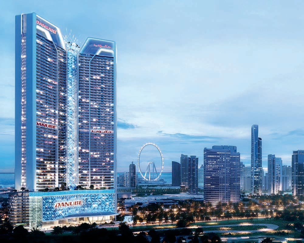 Jumeirah Lakes Towers gains a jewel in its crown – Danube Diamondz by Danube . This prestigious development rises from the heart of the district, offering a lifestyle sculpted for modern luxury. Studios to expansive four-bedroom havens cater to every resident's desire for space and comfort. Light spills through expansive windows, illuminating living areas designed for both relaxation and entertaining. Sleek finishes and well-appointed kitchens create an ambiance of understated elegance. Each apartment is a testament to meticulous design, a sanctuary amidst the city's vibrant hum. Beyond the residence, a world of indulgence unfolds. Danube Diamondz boasts a curated selection of amenities. Work up a sweat on the tennis or cricket courts, unwind with a strike at the bowling alley or gather loved ones for a lively BBQ. Rejuvenation awaits at the aquatic gym and spa, while the yoga deck and sky meditation area offer a haven for tranquility. The rooftop transforms into a private oasis. Lush hammock gardens invite relaxation, while the sky observation deck beckons for stargazing evenings. Aspiring Picassos can even hone their skills at the sky golf course, all while taking in the breathtaking panorama of the city. Danube Diamondz by Danube offers studio, one- to four-bedroom havens starting at AED 1.1 million. The handover is anticipated in Q4 2027 with a flexible 70/30 payment plan.