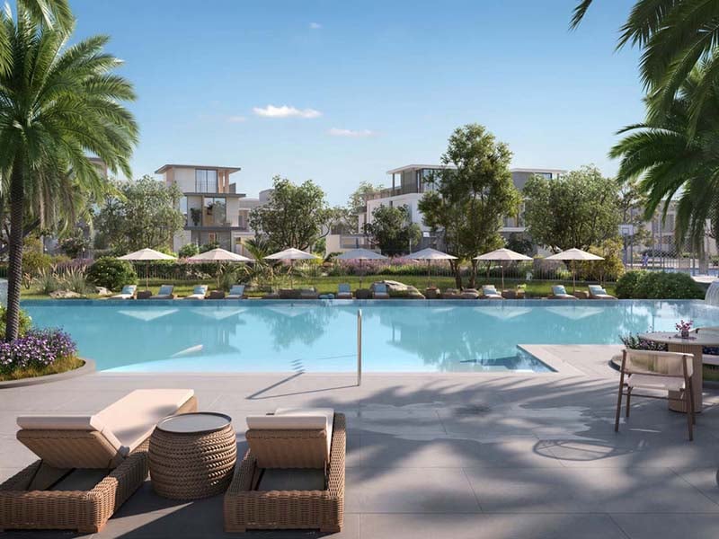 Avena by Emaar at The Valley stands as a testament to the union of nature and contemporary life. This enclave of 4-bedroom villas rests in the serene expanse of The Valley. The charm of Avena by Emaar is in its harmony with the environment, designed for those who seek a life intertwined with nature. At Avena, each 4-bedroom villa stands as a haven of modern design. With three distinct façade styles, these homes blend sleek lines with a cohesive community look. Here, nature is not a backdrop but a living part of the design. Avena at The Valley extends beyond the indoors. The amenities cater to relaxation and outdoor living. Residents can unwind in the landscaped areas, watch films under the night sky at the outdoor cinema or spend quality time with family in the outdoor living spaces. The generous lawn, landscaped pool deck, and kids' playground offer ample room for leisure and play. The state-of-the-art fitness center and indoor multipurpose room ensure that all aspects of life are covered. With 24/7 security and controlled access, Avena by Emaar provides peace of mind alongside its serene lifestyle.