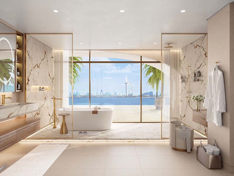 At the heart of Ocean House by Ellington Properties lies a commitment to exquisite oceanside living. Within this haven, a diverse range of 2 to 6-bedroom apartments, duplexes and penthouses awaits. As you step into the lobby, you'll be greeted by a minimalist hotel-like ambiance, defined by a double-height ceiling and elegant neutral decor. Lush greenery enhances the welcoming atmosphere, creating a serene sanctuary for residents and guests alike. Inside, these thoughtfully crafted abodes open to a world of contemporary elegance. With spacious designs and sophisticated neutral palettes, the interiors of Ocean House exude tranquility and sophistication. Floor-to-ceiling windows flood the space with natural light, offering residents breathtaking views of the surroundings. As you explore further, you'll find yourself drawn to the lush private pools and gardens, offering a tranquil retreat amidst the bustling city. Designed with utmost privacy and serenity in mind, these outdoor spaces provide residents with a sanctuary to relax and unwind. Venturing beyond the confines of your home, you'll encounter a wealth of private club-inspired amenities, including a 50-meter Olympic swimming pool, a wellness studio, clubhouse and cinema room.  Starting at AED 9.5M, Ocean House by Ellington Properties offers 2 to 6-bedroom apartments, duplexes and penthouses. The handover is expected in Q2 2026 with a 70/30 payment plan.