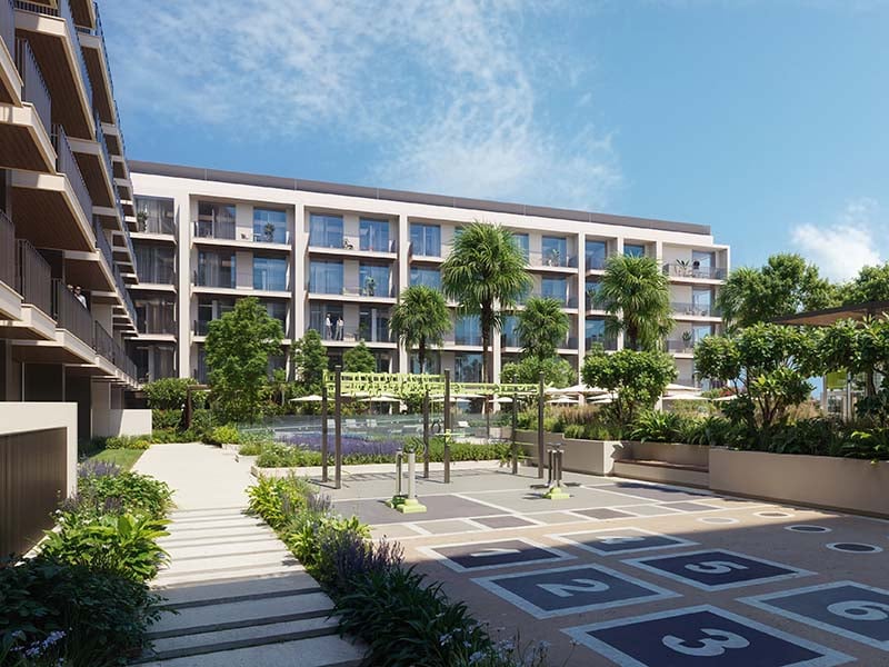 Aurora by Binghatti at Jumeirah Village Circle unfolds a new chapter in urban living. This project introduces a blend of simplicity and precision, seamlessly integrating with its surroundings. The design resonates with the rhythm of city life while creating a tranquil space for its residents. Aurora brings together form and function. The clean lines of its architecture are a testament to thoughtful design, aiming for a seamless blend with the cityscape. The facade engages with the skyline while providing a calm backdrop for residents. Inside, Aurora offers a range of living spaces from studios to 1-2 bedroom apartments. Each unit is crafted to enhance everyday life, maximizing natural light and providing a sense of openness. The interiors are designed with practicality in mind, balancing comfort with simplicity. The amenities at Aurora are tailored to support a balanced lifestyle. From the pools for all ages to the yoga area and fitness facilities, each element is positioned to foster well-being. Green spaces and relaxation areas invite residents to enjoy moments of peace amidst the city's rhythm.