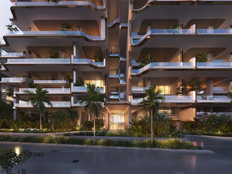 Ela Residences by Omniyat redefines ultra-luxury living on Palm Jumeirah. This exclusive collection of 3- and 4-bedroom apartments is crafted to embody the zenith of sophistication and privacy. Situated on one of the island’s most coveted plots, these residences offer sweeping views of the Arabian Gulf and the glittering Dubai skyline. Zaha Hadid's innovative architecture shapes Ela Residences with her signature style evident in the sweeping, fluid forms and cutting-edge aesthetics. Each residence features expansive terraces that seamlessly connect indoor living spaces with the serene outdoors. Floor-to-ceiling windows flood the interiors with natural light, enhancing the sense of openness and framing breathtaking vistas. The interiors, curated by the Dorchester Collection, reflect a commitment to luxury and refinement. Premium materials and bespoke finishes are meticulously chosen, creating spaces that are both elegant and functional. Each apartment is designed to offer a refined living experience where every detail contributes to an atmosphere of exclusivity and comfort. Located on the Eastern Crescent, Ela Residences offers direct beachfront access and panoramic views, providing a rare combination of privacy and prestige and setting a new standard for luxury living on Palm Jumeirah. Starting at AED 43M, Ela Residences by Omniyat offers 3- and 4-bedroom apartments. The handover is expected in Q1 2028 with a 60/40 payment plan.