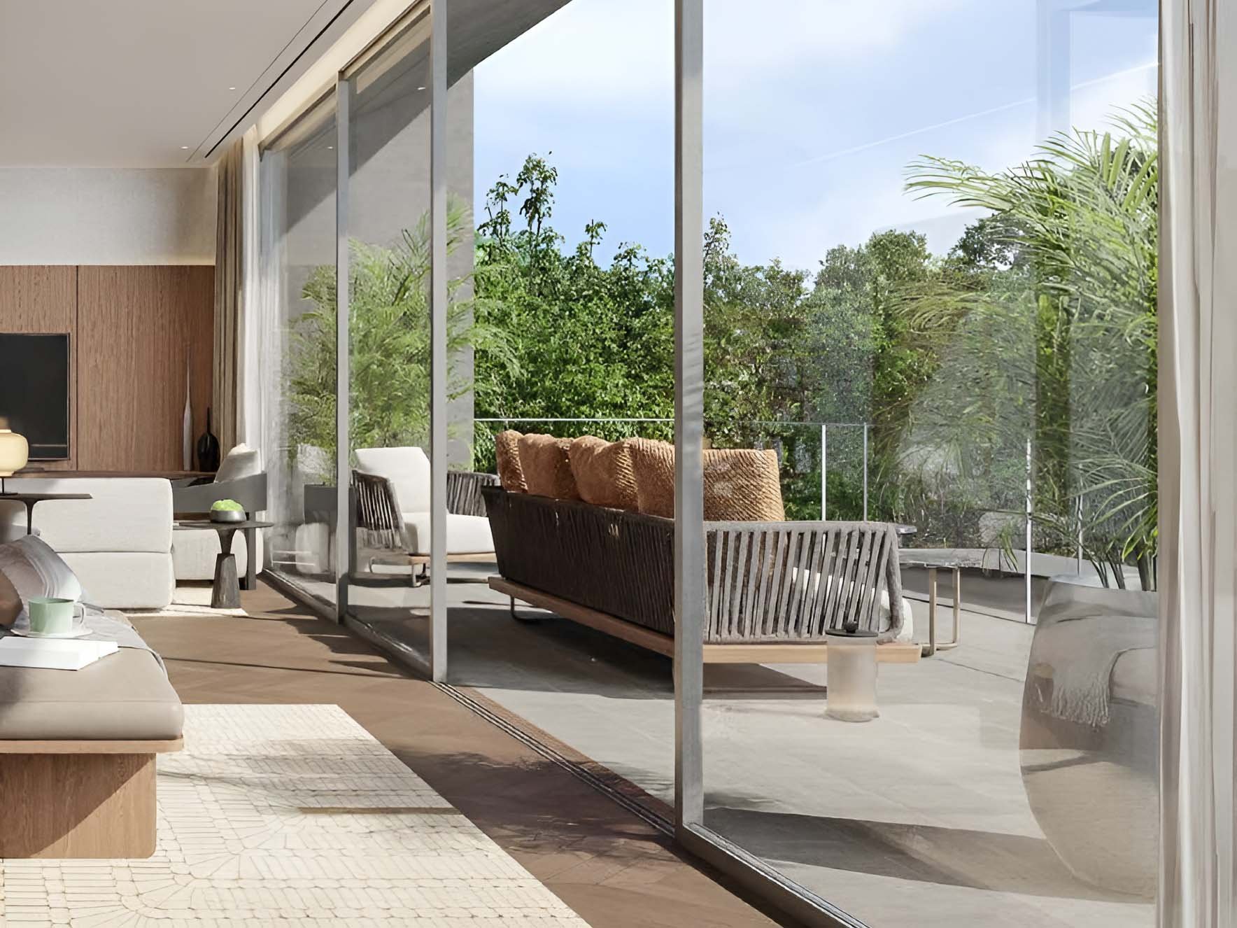 Serenity Mansions by Majid Al Futtaim rises in Tilal Al Ghaf, showcasing a series of 6-7 bedroom villas meticulously crafted to harmonize with their natural surroundings. Each villa features large glass facades and modern lines, allowing natural light to fill the interiors and connect the living spaces to the outdoors. The exterior design includes expansive terraces and private gardens, enhancing the outdoor living experience. Roof terraces provide panoramic views of the landscape, adding a serene space to relax. Facades combine natural materials with contemporary finishes for a striking yet understated look. Inside, Serenity Mansions emphasizes spaciousness and flexibility. Open-plan layouts create a free flow between rooms with high ceilings and large windows contributing to an airy atmosphere. Kitchens are equipped with modern appliances and ample storage while bathrooms offer a sanctuary-like retreat with elegant fixtures. Bedrooms, including master suites, provide privacy and comfort. The landscaping complements the villas with manicured gardens and private pools enhancing the outdoor spaces. Each villa's interior and exterior are designed to reflect a harmonious balance of modern living and natural beauty.