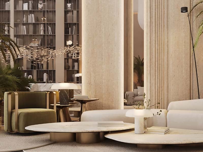 Cove by Imtiaz emerges in Dubailand as a vertical sanctuary. Its pearl white façade echoes the desert's timeless palette while its interiors redefine urban living. Within this tower, homes range from studios to two-bedroom retreats. Each space tells a story of thoughtful design. Kitchens become culinary stages with clean lines and intuitive layouts. Bathrooms transform into personal spas, marrying form and function. Bedrooms offer respite with views that frame Dubai's evolving skyline. Cove's true character unfolds in its shared spaces. An infinity pool seemingly merges with the horizon. For the active, a padel court awaits. A running track winds through the property, offering a path for morning jogs or evening strolls. Quieter moments find their place too. Serene cabanas offer pockets of tranquility. A yoga deck and a fully equipped gym, with its array of equipment, stand ready for those seeking a moment of calm or physical challenge. As day turns to evening, the open-air cinema flickers to life. Nearby, BBQ areas invite culinary experiments and social gatherings. Throughout Cove, green spaces create breathing room. These pockets of nature soften the urban edge, providing impromptu meeting spots or solitary retreats.